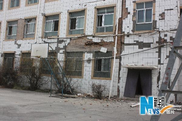 A strong earthquake rocked northwestern China on Wednesday, killing about 300 people and injuring another 8,000 as it toppled houses in a remote mountainous area, the government said.