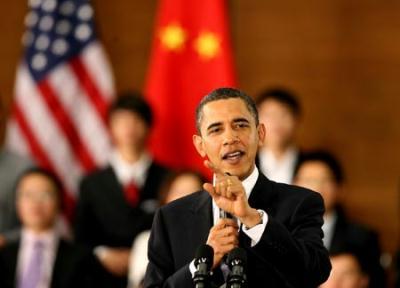 U.S. President Barack Obama gestures as he delivers a speech at a dialogue with Chinese youth at the Shanghai Science and Technology Museum during his four-day state visit to China, Nov. 16, 2009.(Xinhua/Chen Fei)