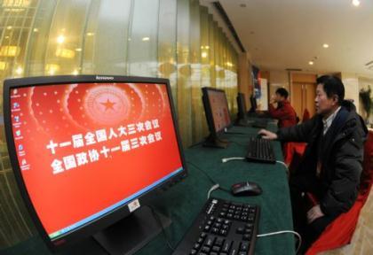 Media workers operate computers at media center for Chinese People's Political Consultative Conference (CPPCC) and National People's Congress (NPC) in Beijing, capital of China, Feb. 26, 2010. The media center for domestic and foreign reporters has come into use on Friday. (Xinhua/Jin Liangkuai)