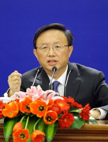 Chinese Foreign Minister Yang Jiechi answers questions during a news conference on the sidelines of the Third Session of the 11th National People's Congress (NPC) at the Great Hall of the People in Beijing, China, March 7, 2010.(Xinhua/Xing Guangli)