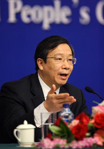 Yi Gang, vice governor of the People's Bank of China and also director of the State Administration of Foreign Exchange, answers questions during a press conference on foreign exchange control and foreign exchange reserve held on the sidelines of the Third Session of the 11th National People's Congress in Beijing, China, March 9, 2010. (Xinhua/Yuan Man)