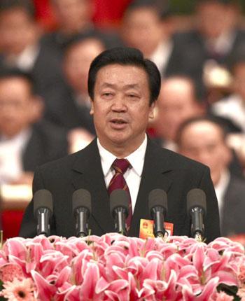 Wang Shengjun, President of the Supreme People's Court, delivers the supreme court's work report during the fourth plenary meeting of the Third Session of the 11th National People's Congress (NPC) held at the Great Hall of the People in Beijing, capital of China, March 11, 2010. (Xinhua/Yao Dawei)