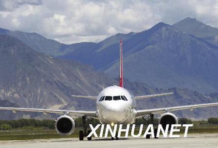 An undated photo shows a passenger plane landing at the Lhasa Gonggar Airport. (Xinhua/Phurbu Tashi)