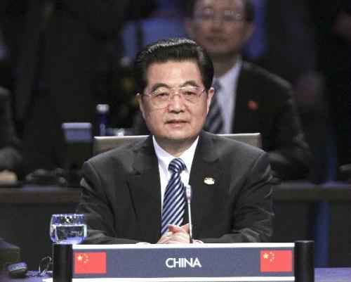 Chinese President Hu Jintao attends the first plenary session of the Nuclear Security Summit at the Washington Convention Center in Washington, April 13, 2010. (Xinhua/Ju Peng)