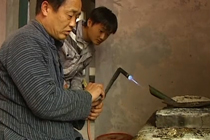 Silversmiths:  Miao woman&acute;s silver accessories must be hand made