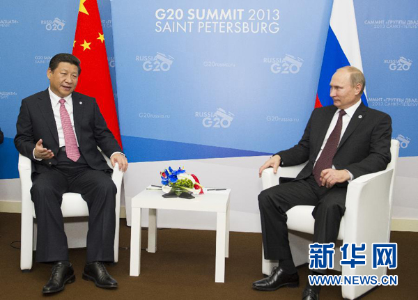 9月5日，国家主席习近平在圣彼得堡会见俄罗斯总统普京。