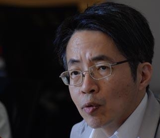 香港《明报》前总编刘进图遇袭背部中刀（图）