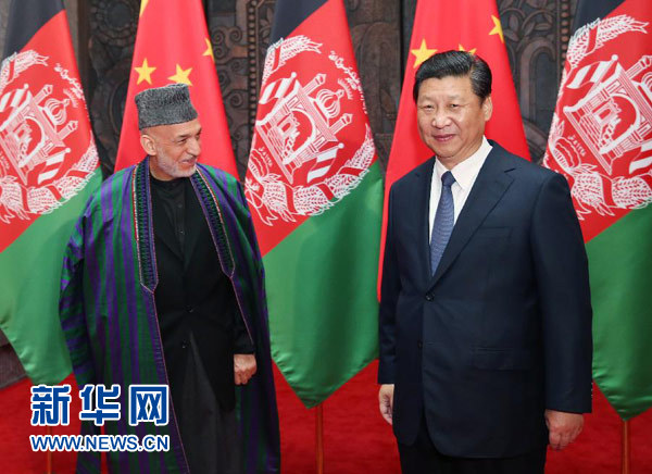 　　5月19日，国家主席习近平在上海会见阿富汗总统卡尔扎伊。新华社记者 姚大伟 摄