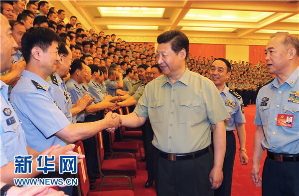 6月17日，中共中央总书记、国家主席、中央军委主席习近平在北京接见空军第十二次党代会代表，并发表重要讲话。 记者 李刚 摄 