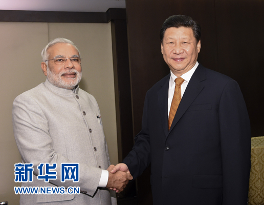 7月14日，国家主席习近平在巴西福塔莱萨会见印度总理莫迪。新华社记者李学仁摄