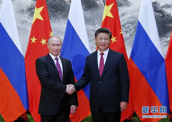 6月25日，国家主席习近平在北京人民大会堂同俄罗斯总统普京举行会谈。 新华社记者 鞠鹏 摄
