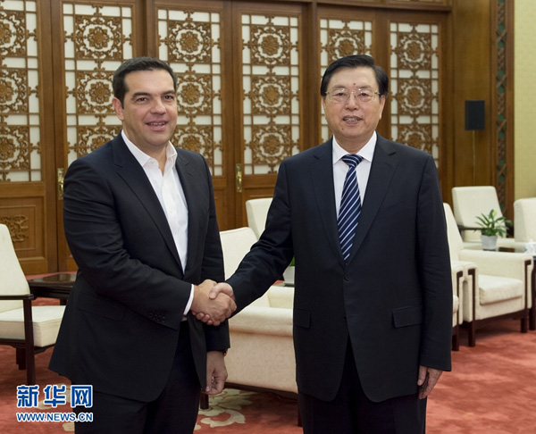 7月4日，全国人大常委会委员长张德江在北京人民大会堂会见希腊总理齐普拉斯。 新华社记者 王晔 摄 