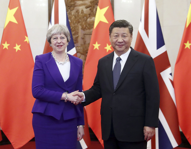 2月1日，国家主席习近平在北京钓鱼台国宾馆会见来华进行正式访问的英国首相特雷莎·梅。