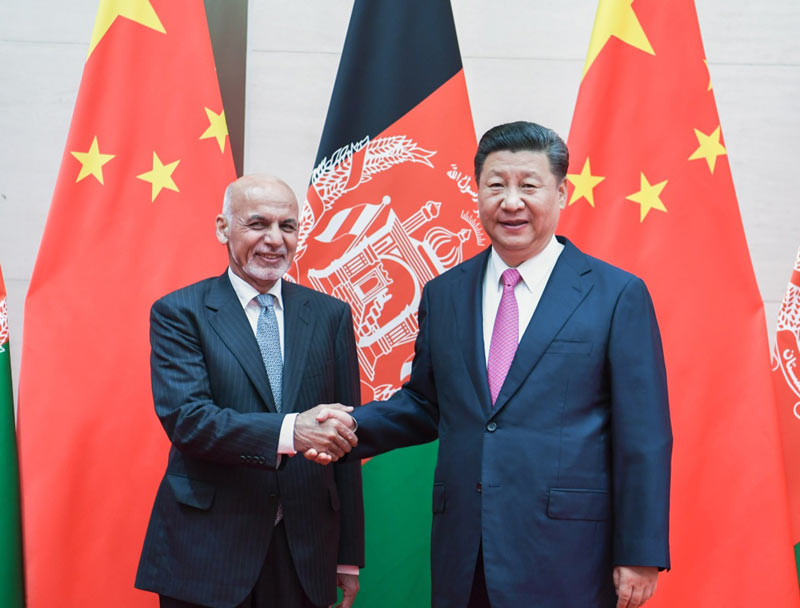 6月10日，国家主席习近平在青岛会见阿富汗总统加尼。
