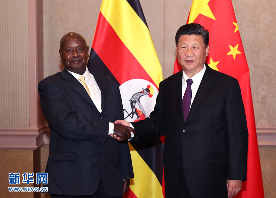 7月26日，国家主席习近平在南非约翰内斯堡会见乌干达总统穆塞韦尼。
