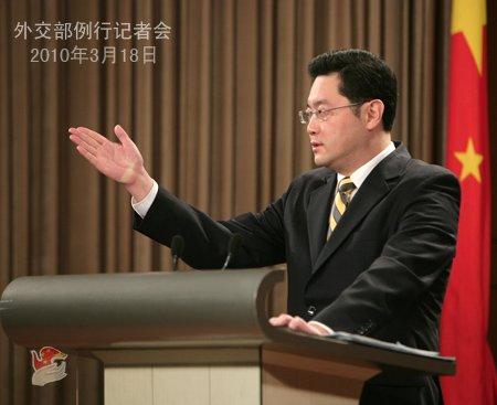 Foreign Ministry spokesman Qin Gang says US demands that China revalue its currency are "unfair and harmful".