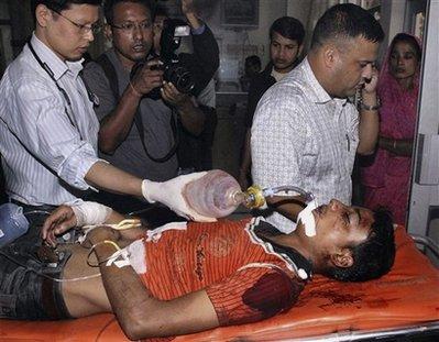 Medical&nbsp;staff&nbsp;carry&nbsp;a&nbsp;blast&nbsp;victim&nbsp;for&nbsp;treatment&nbsp;at&nbsp;Gauhati&nbsp;Medical&nbsp;College&nbsp;Hospital&nbsp;in&nbsp;Gauhati,&nbsp;India,&nbsp;Sunday,&nbsp;Nov.&nbsp;22,&nbsp;2009.&nbsp;Two&nbsp;bombs&nbsp;exploded&nbsp;in&nbsp;India's&nbsp;restive&nbsp;northeast&nbsp;Sunday,&nbsp;police&nbsp;said.(AP&nbsp;Photo)