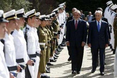 Israel's&nbsp;President&nbsp;Shimon&nbsp;Peres&nbsp;(R)&nbsp;and&nbsp;his&nbsp;Brazilian&nbsp;counterpart&nbsp;Luiz&nbsp;Inacio&nbsp;Lula&nbsp;da&nbsp;Silva&nbsp;(2nd&nbsp;R)&nbsp;review&nbsp;an&nbsp;honour&nbsp;guard&nbsp;during&nbsp;a&nbsp;welcoming&nbsp;ceremony&nbsp;on&nbsp;Lula's&nbsp;behalf&nbsp;at&nbsp;Peres'&nbsp;residence&nbsp;in&nbsp;Jerusalem&nbsp;March&nbsp;15,&nbsp;2010.&nbsp;REUTERS/Baz&nbsp;Ratner