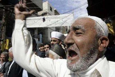 A&nbsp;Palestinian&nbsp;Islamist&nbsp;shouts&nbsp;slogans&nbsp;during&nbsp;an&nbsp;anti-Israel&nbsp;protest&nbsp;at&nbsp;Ain&nbsp;el-Hilweh&nbsp;refugee&nbsp;camp,&nbsp;southern&nbsp;Lebanon&nbsp;March&nbsp;19,&nbsp;2010.&nbsp;The&nbsp;protest&nbsp;was&nbsp;held&nbsp;to&nbsp;express&nbsp;solidarity&nbsp;with&nbsp;Palestinians&nbsp;and&nbsp;against&nbsp;Israeli&nbsp;settlement&nbsp;building&nbsp;plans&nbsp;in&nbsp;Jerusalem.&nbsp;REUTERS/Ali&nbsp;Hashisho&nbsp;
