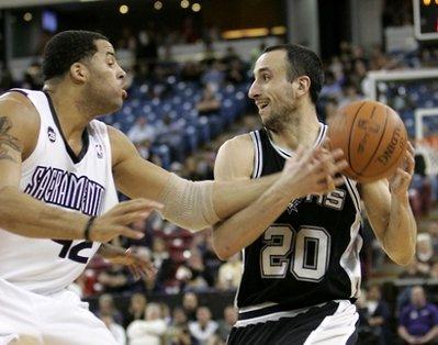 San Antonio Spurs guard Manu Ginobili, right, of Argentina, is fouled by Sacramento Kings forward Sean May during the second quarter of an NBA basketball game in Sacramento, Calif., Tuesday, April 6, 2010. The Spurs won 95-86.(AP Photo/Rich Pedroncelli)