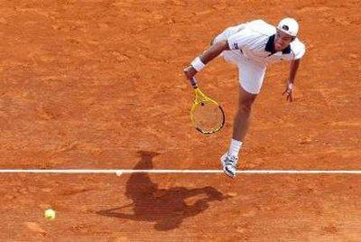 Richard Gasquet of France serves to Daniel Gimeno-Traver of Spain during their first round match at the Monte Carlo Masters tennis tournament in Monaco April 12, 2010.REUTERS/Sebastien Nogier (MONACO - Tags: SPORT TENNIS)