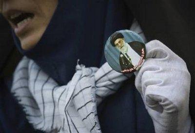 A&nbsp;woman&nbsp;holds&nbsp;a&nbsp;button&nbsp;with&nbsp;a&nbsp;picture&nbsp;of&nbsp;Iran's&nbsp;Supreme&nbsp;Leader&nbsp;Ayatollah&nbsp;Ali&nbsp;Khamenei&nbsp;while&nbsp;attending&nbsp;an&nbsp;anti-Israel&nbsp;demonstration&nbsp;after&nbsp;Friday&nbsp;prayers&nbsp;in&nbsp;Tehran&nbsp;October&nbsp;9,&nbsp;2009.&nbsp;Khamenei&nbsp;says&nbsp;the&nbsp;US&nbsp;approach&nbsp;toward&nbsp;Iran&nbsp;contradicts&nbsp;talk&nbsp;of&nbsp;changes&nbsp;to&nbsp;policy.&nbsp;He&nbsp;rejects&nbsp;any&nbsp;discussions&nbsp;in&nbsp;which&nbsp;the&nbsp;US&nbsp;decides&nbsp;the&nbsp;results&nbsp;in&nbsp;advance.(REUTERS/Morteza&nbsp;Nikoubazl)