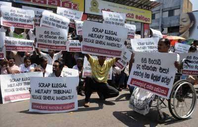 Activists&nbsp;protest&nbsp;against&nbsp;the&nbsp;military&nbsp;detention&nbsp;of&nbsp;former&nbsp;Army&nbsp;chief&nbsp;turned&nbsp;opposition&nbsp;leader&nbsp;Sarath&nbsp;Fonseka&nbsp;in&nbsp;Colombo&nbsp;on&nbsp;March&nbsp;15.&nbsp;(AFP/Lakruwan&nbsp;Wanniarachchi)