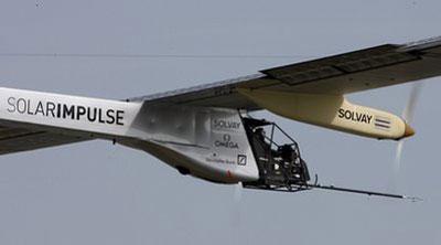 The solar powered aircraft 'Solar Impulse' (HB-SIA prototype) steered by test pilot Markus Scherdel is airborne during its maiden flight at the military airport in Payerne, Switzerland, Wednesday, April 7, 2010. (AP Photo/Christian Hartmann, pool)