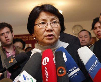 Kyrgyzstan's interim government leader Roza Otunbayeva speaks to the media in Bishkek, Kyrgyzstan, on Monday, April 12, 2010. (AP Photo/Nina Gorshkova)