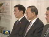 习近平集体会见英国友人