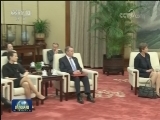 张德江会见英国首相