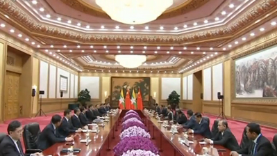 习近平会见缅甸国务资政