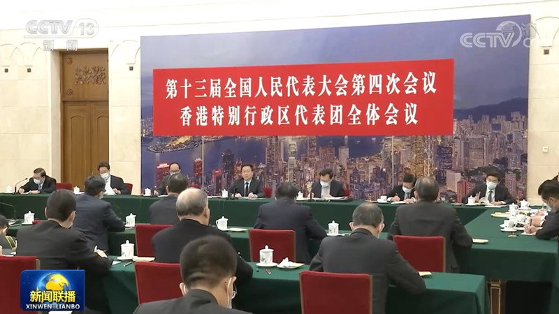 韩正分别参加香港代表团、澳门代表团审议