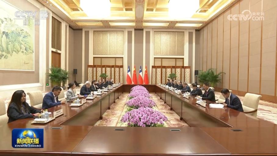 李强会见智利总统