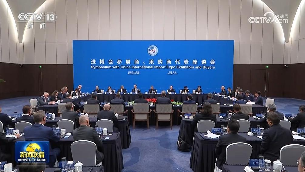 李强同第七届中国国际进口博览会参展商、采购商代表座谈