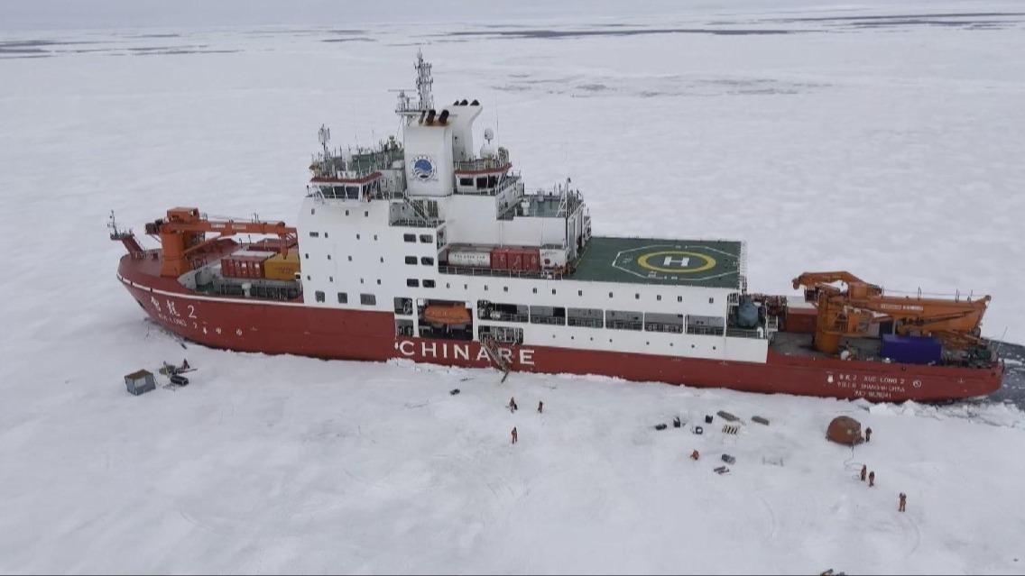China's icebreaker Xuelong 2 chops way through thick ice in 13th Arctic expedition
