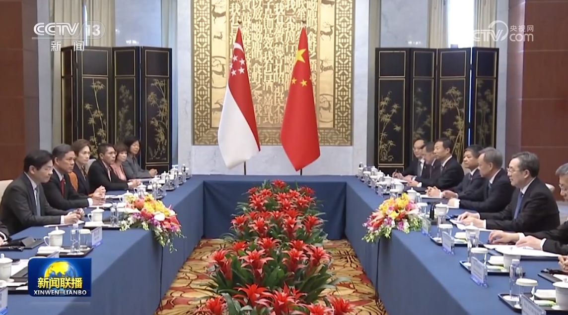 丁薛祥会见新加坡副总理兼财政部长并共同主持中新双边合作机制会议
