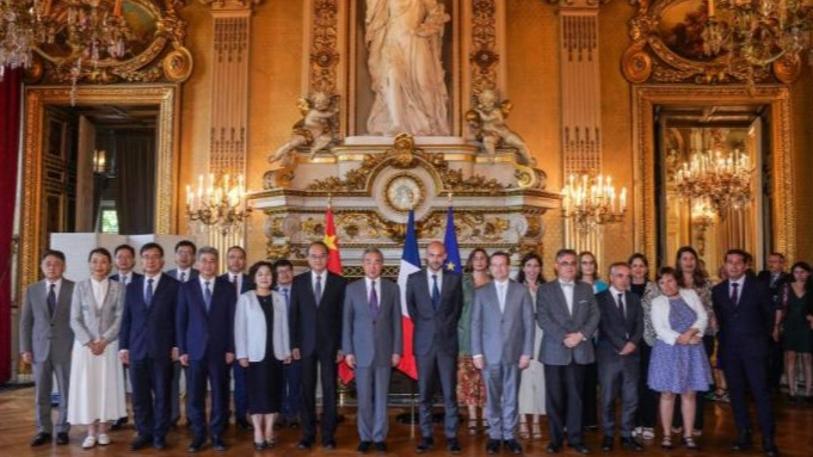 Chinese FM urges China, France to further enhance people-to-people exchanges