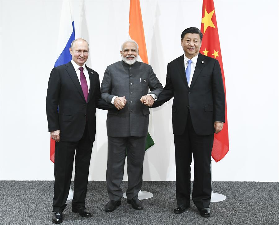 Chinese President Xi Jinping (R) meets with Russian President Vladimir Putin (L) and Indian Prime Minister Narendra Modi at a meeting on the sidelines of a summit of the Group of 20 (G20) major economies in the Japanese city of Osaka, June 28, 2019. (Xinhua/Xie Huanchi)