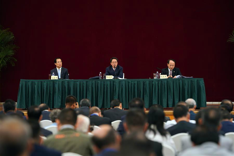A symposium is jointly held by the Hong Kong and Macao Affairs Office of the State Council and the Liaison Office of the Central People