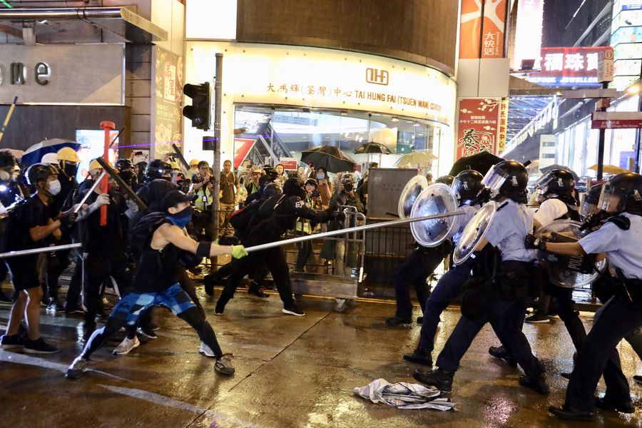 Radical protesters attack police officers in Tsuen Wan, in the western New Territories of south China
