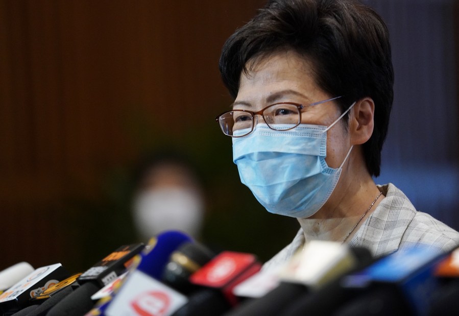Chief Executive of the Hong Kong Special Administrative Region Carrie Lam receives an interview after inspecting a polling station at Hong Kong Convention and Exhibition Center in Hong Kong, south China, Sept. 19, 2021. (Xinhua/Wang Shen)