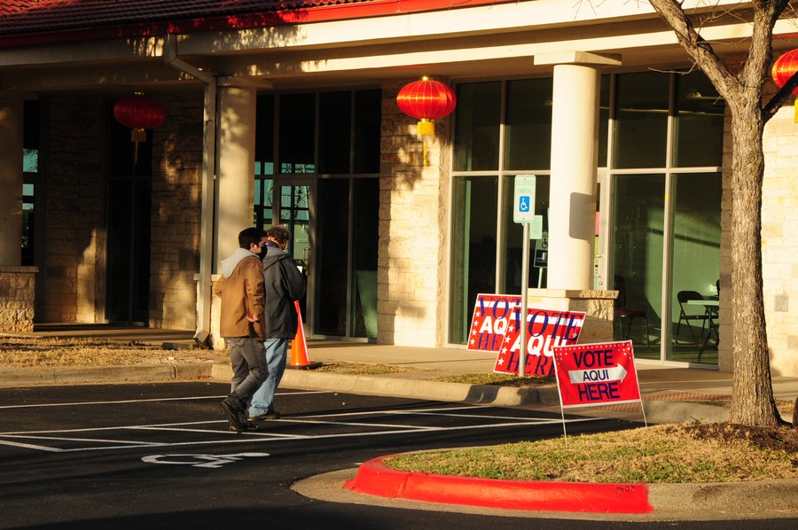 Voters arrive at a polling station for the Texas 2022 primary election in Austin, Texas, the United States, on March 1, 2022. (Photo by Bo Lee/Xinhua)