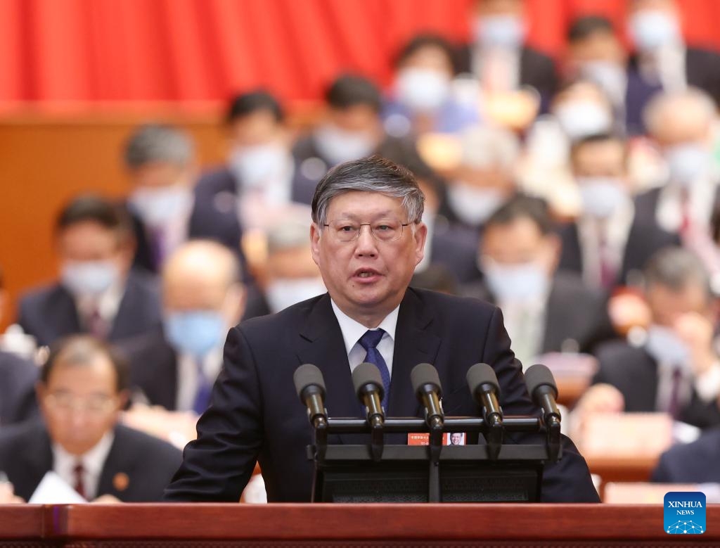 Liu Xincheng delivers a report on how the proposals from political advisors have been handled at the opening meeting of the fifth session of the 13th National Committee of the Chinese People’s Political Consultative Conference (CPPCC) at the Great Hall of the People in Beijing, capital of China, March 4, 2022. (Xinhua/Ding Lin)