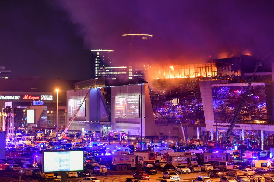 Smoke from fire rises above the burning Crocus City Hall concert venue following a shooting incident in the northwest of Moscow, Russia, on March 22, 2024. At least 40 people were killed and more than 100 injured after a shooting at the Crocus City Hall concert venue on Friday, according to preliminary data from the Russian Federal Security Service. (Xinhua/Cao Yang)