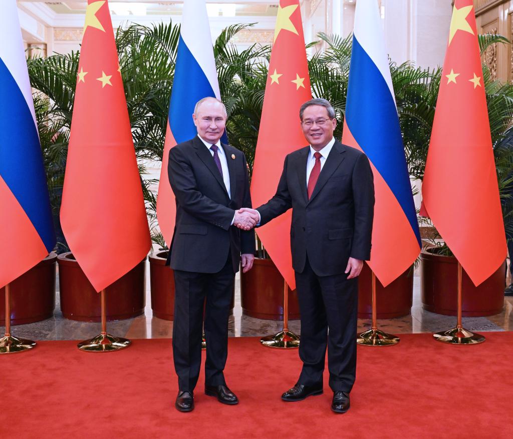 Chinese Premier Li Qiang meets with Russian President Vladimir Putin, who is in China on a state visit, at the Great Hall of the People in Beijing, capital of China, May 16, 2024. (Xinhua/Rao Aimin)